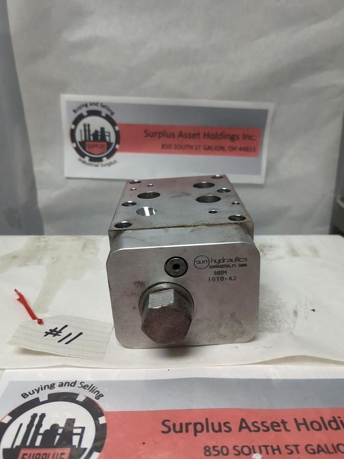 Used SUN HYDRAULICS,HBM,MANIFOLD IGTO-A2 WITH CKGB-XCN VALVE/BOLT USED