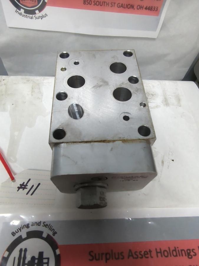 Used SUN HYDRAULICS,HBM,MANIFOLD IGTO-A2 WITH CKGB-XCN VALVE/BOLT USED