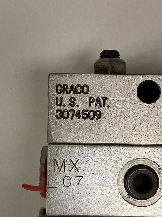 Used Graco,MXL07-100T, MXJ10100T MXJ10-100T, Divider Valve 3074509