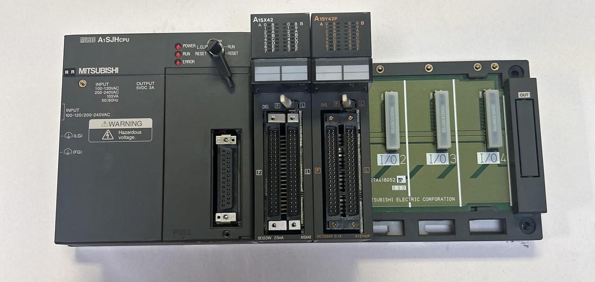 Used MITSUBISHI,A1SJHCPU,CPU UNIT W/ A1SX42 & A1SY42P MODULES