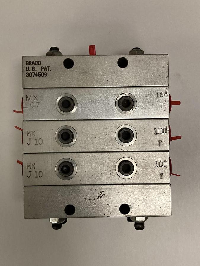 Used Graco,MXL07-100T, MXJ10100T MXJ10-100T, Divider Valve 3074509
