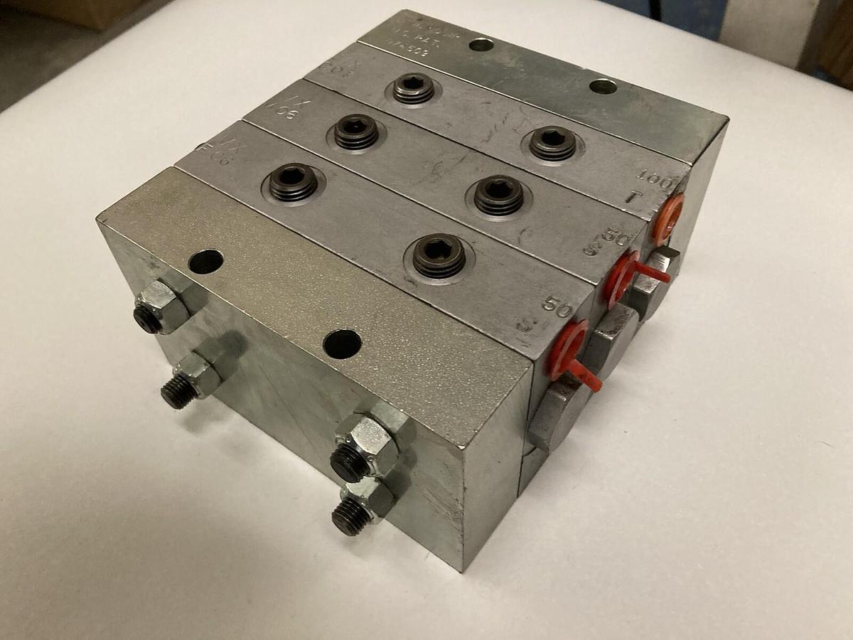 Used Graco,MXE00-125T MXL07-100T MXJ10-100T, Divider Valve 3074509