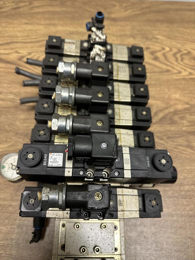 Used SMC,7 EA.VP7-6-FG-D,Solenoid Valves 1EA. ARB250-00 W/10 Valve Manifold