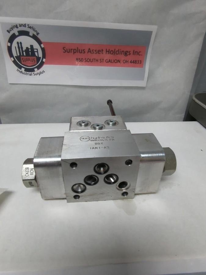 Used SUN HYDRAULICS,BBY,MANIFOLD IANI-A2+ WITH CKEB-XCN CARTRIDGE VALVE/BOLT USED
