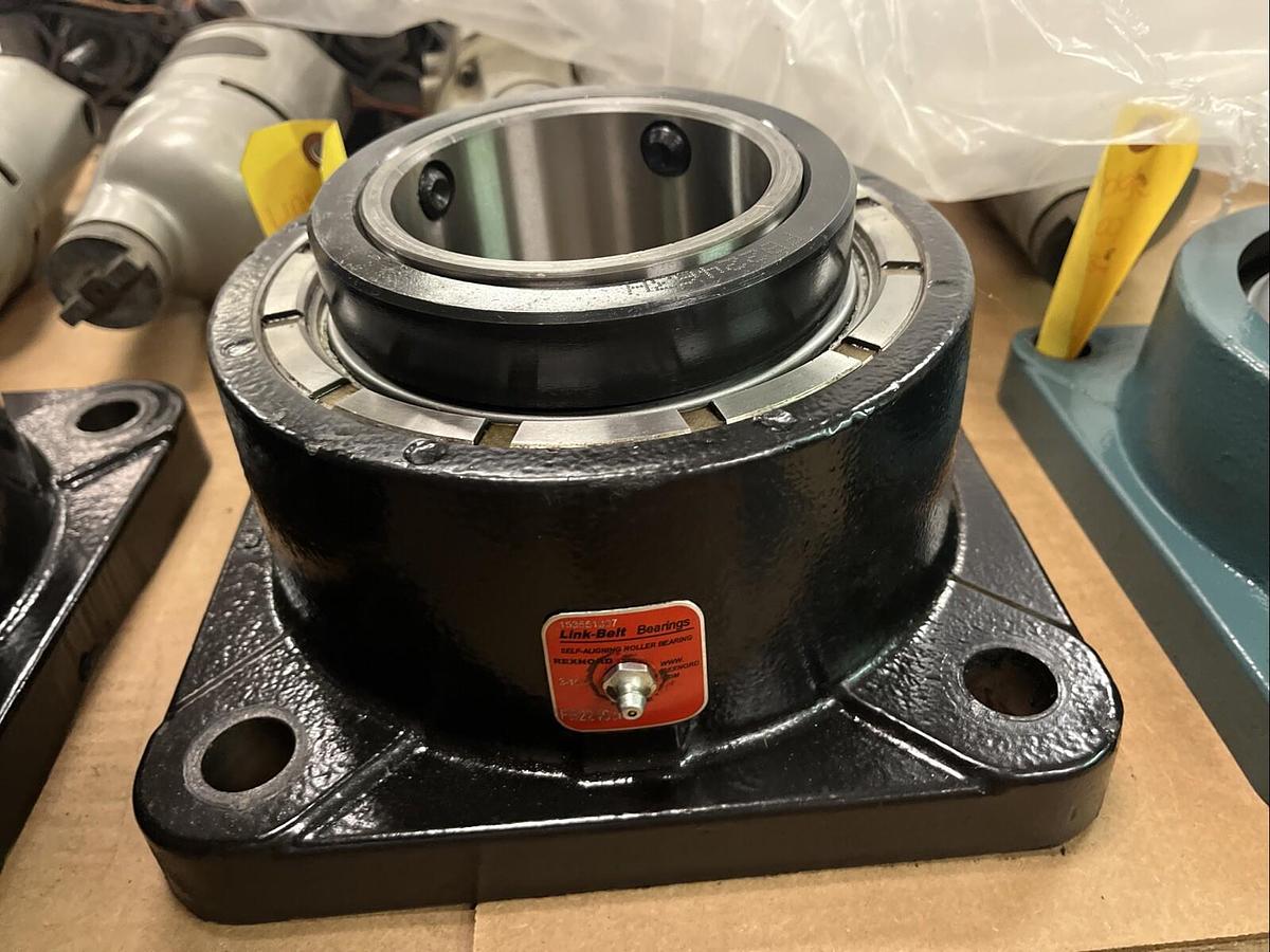 Used REXNORD LINK BELT,FEB22463H,SELF ALIGNING FLANGE ROLLER BEARING 3-15/16" BORE