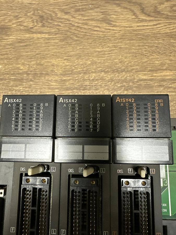 Used Mitsubishi,A1SJHCPU,W/3 A1SY42 Output Modules