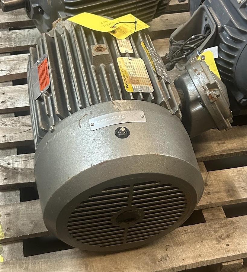 Used BALDOR,X256T,SUPER-E MOTOR 20HP 460V 1770RPM 3PH X256T FRAME BROKEN FOOT