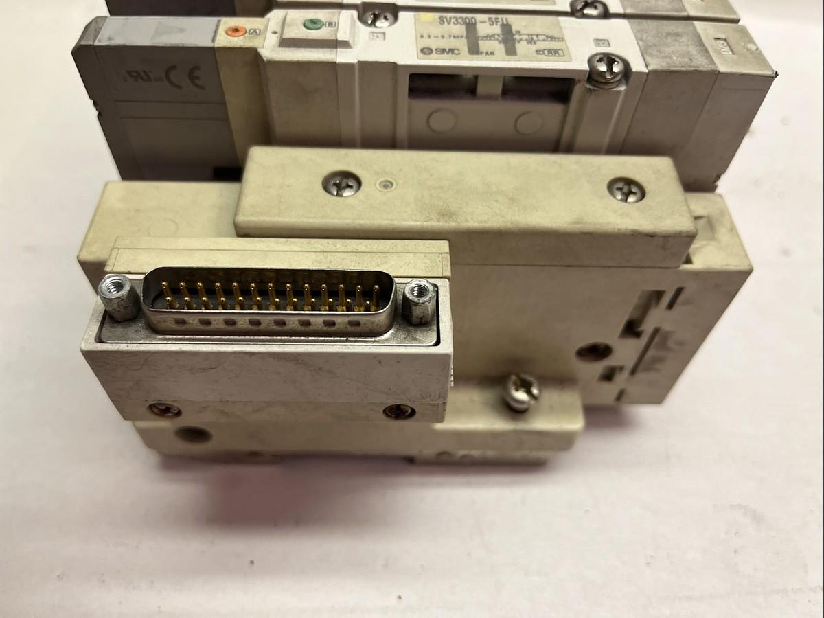Used SMC,SV3300-5FU,PNEUMATIC AIR VALVE BANK 5 SOLENOID VALVES