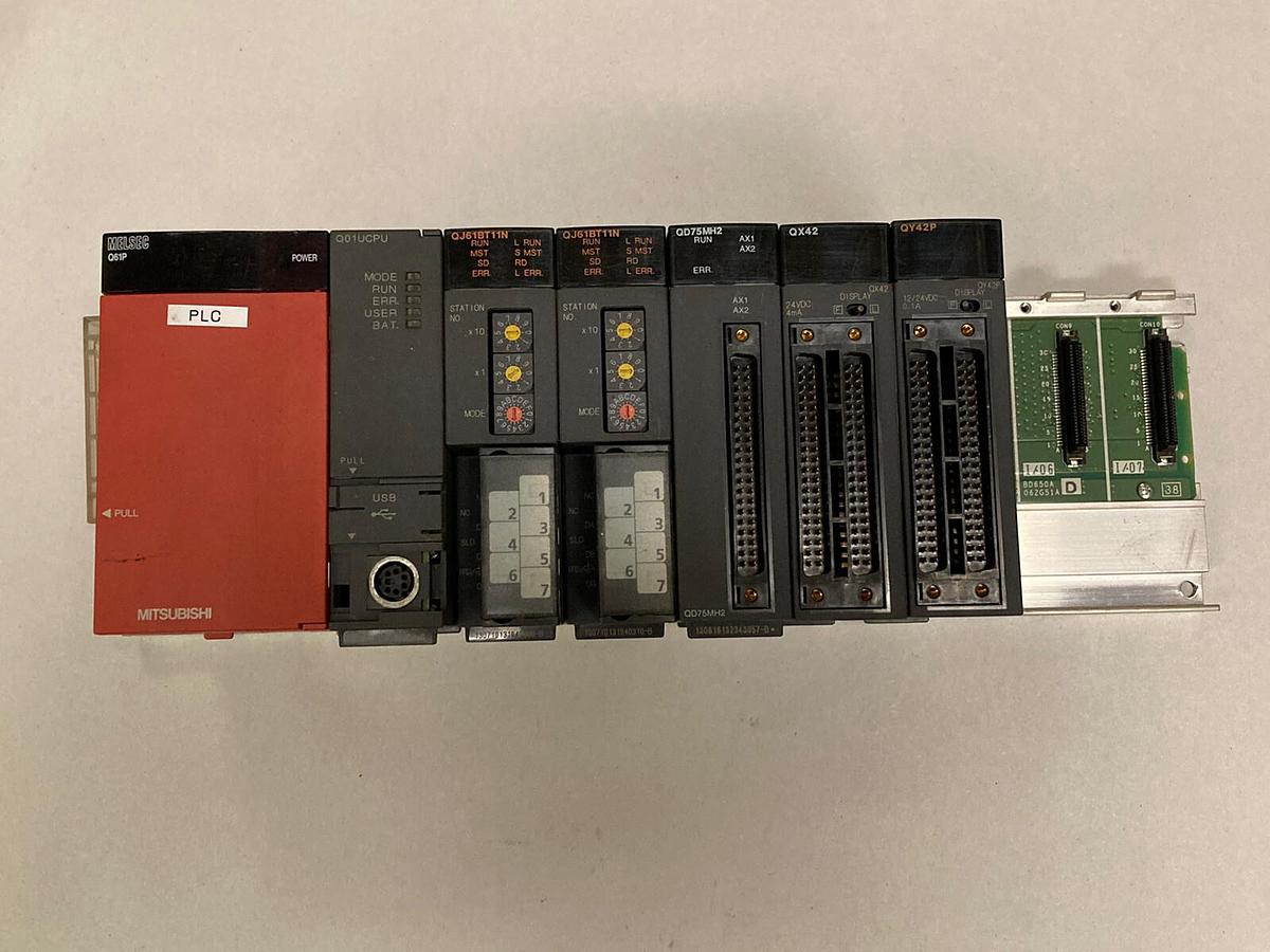 Used Mitsubishi,Q61P Q01UCPU QJ61BT11N  x2 QD75MH2 QX42 QY42P,Rack Assembly