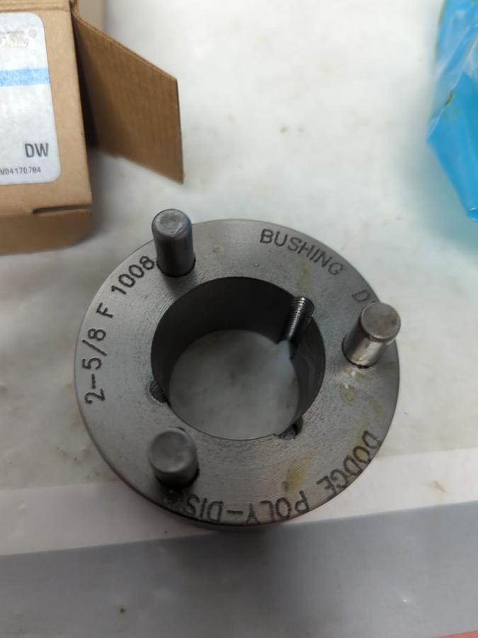 BALDOR-DOGE,008058,POLY DISC FLANGE 2-5/8 INCH NOS