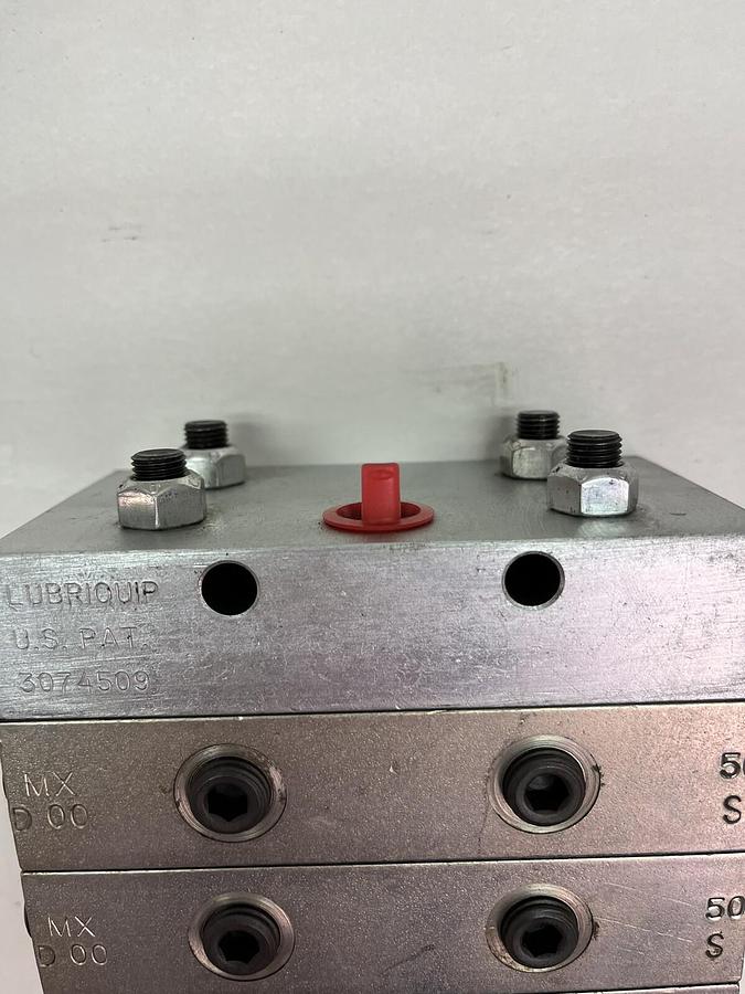 Used LUBRIQUIP,MXE-00-25S,W TWO MXD-00-50S VALVE BANK