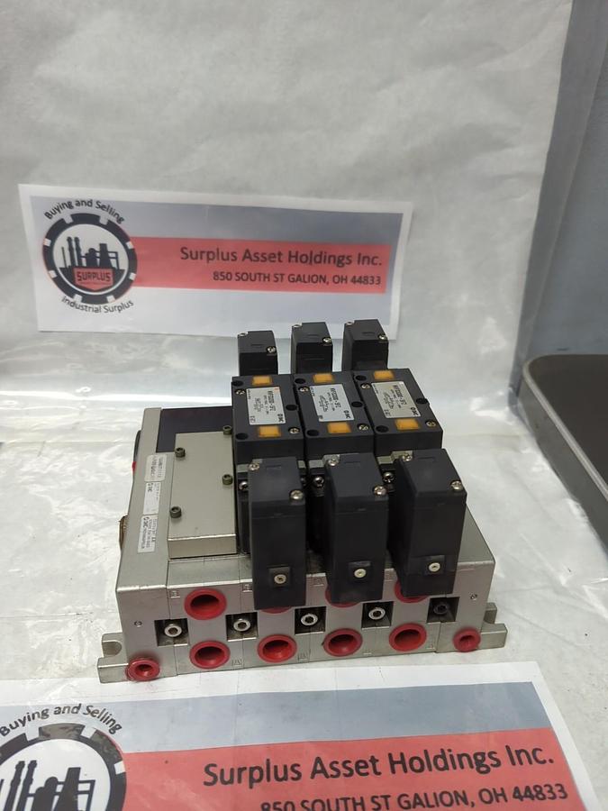 Used SMC,NVV5FS3-01T-041-03T,PNEUMATIC MANIFOLD W/ 3 VALVES NVFS3300-5FZ USED