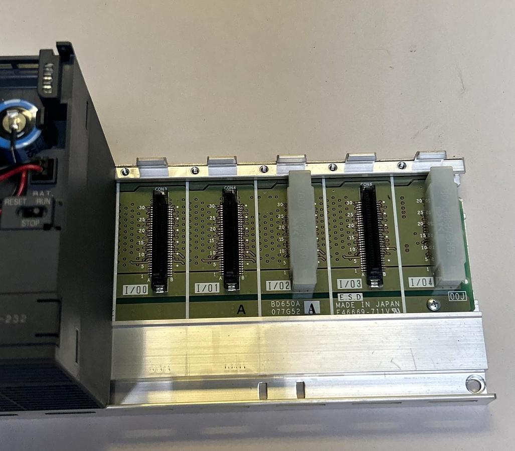 Used MITSUBISHI,Q00JCPU,POWER SUPPLY AND CPU MODULE W/ RACK MISSING COVER