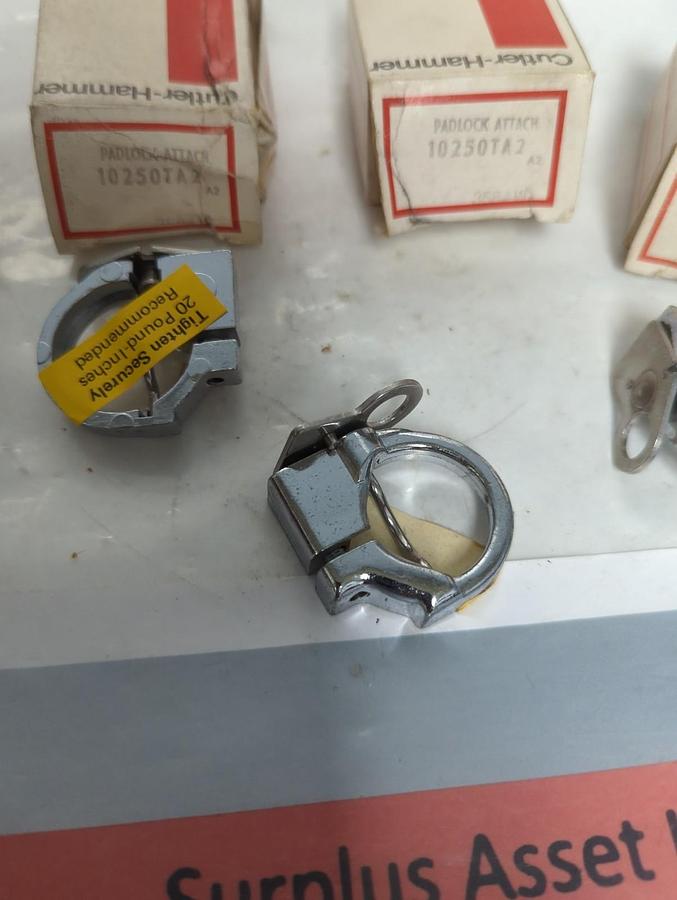 CUTLER HAMMER,10250TA2,PADLOCK ATTACHMENT FOR PUSHBUTTON LOT OF 4 NOS