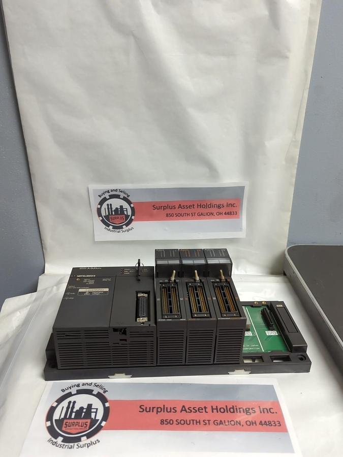 Used MITSUBISHI,A1SJHCPU,MELSEC PROG. CONTROLLER LOGIC/RACK WITH (3) A1SY42 MODULES