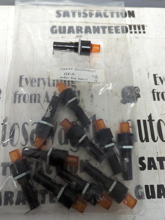 COOPER BUSSMANN,HKA,INCANDESENT AMBER OCTAGON PANEL MOUNT FUSE HOLDERS LOT OF 11