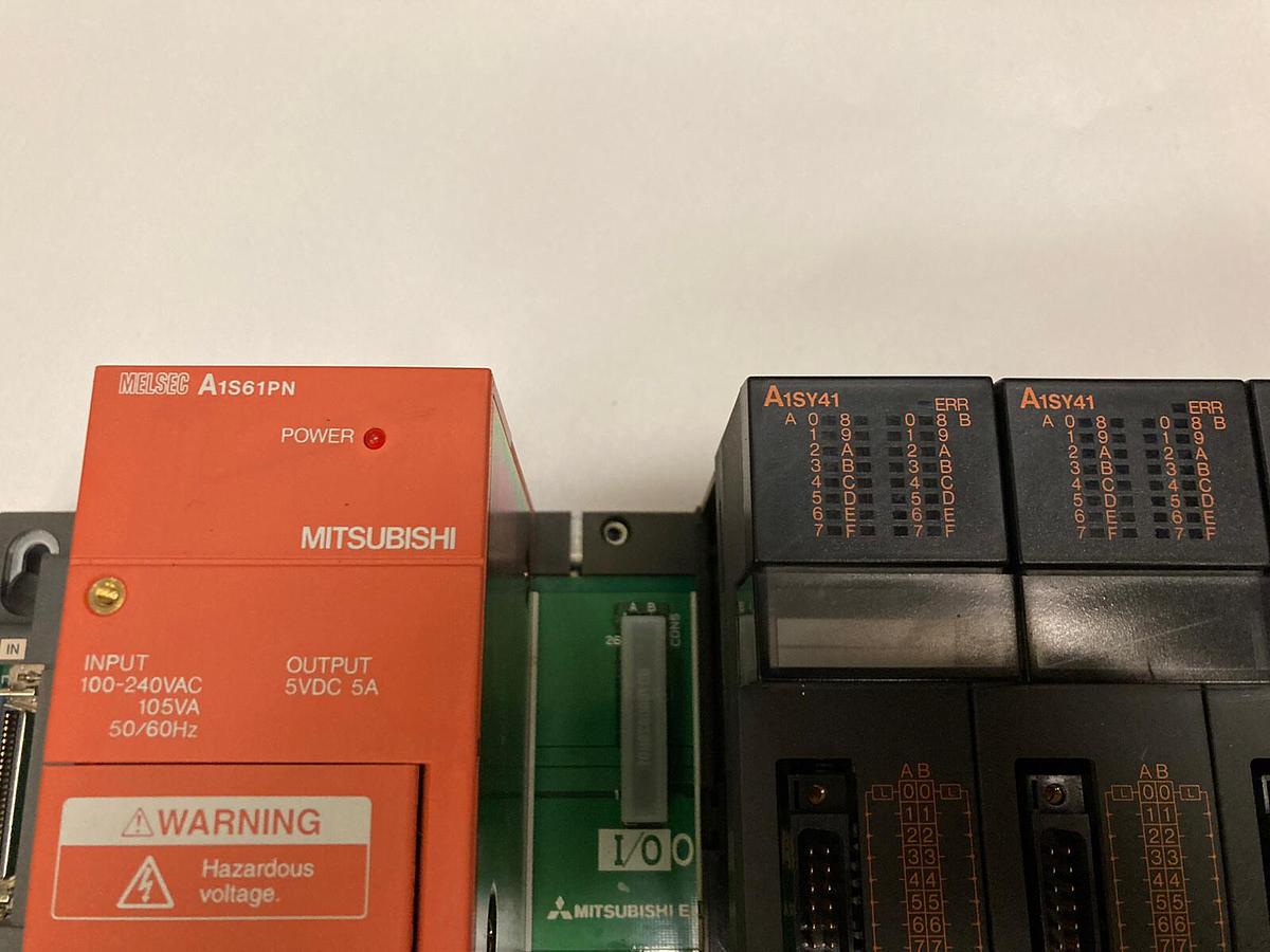 Used Mitsubishi,A1S61PN/A1SY41 (x3) /A1SH42/ A1SX42/A1SJ61BT11,Rack Assembly