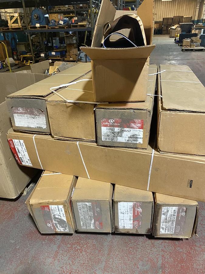 Used CARBORUNDUM,38657,80GRIT ZIRCONIA ALUMINA RESIN CLOTH 51"X126 3 BELTS SKID OF 14