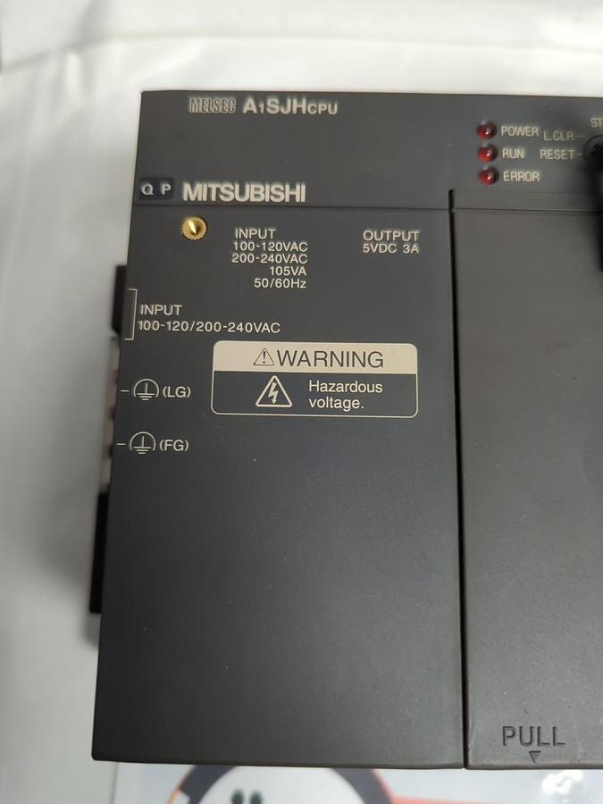 Used MITSUBISHI,A1SJHCPU,MELSEC PROG. CONTROLLER LOGIC/RACK WITH (3) A1SY42 MODULES