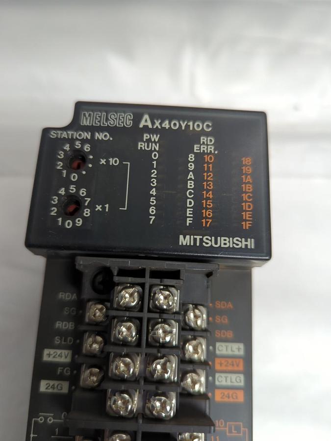 Used MITSUBISHI,AX40Y10C,MELSEC INPUT/OUTPUT UNIT MISSING DOORS PRE-OWNED