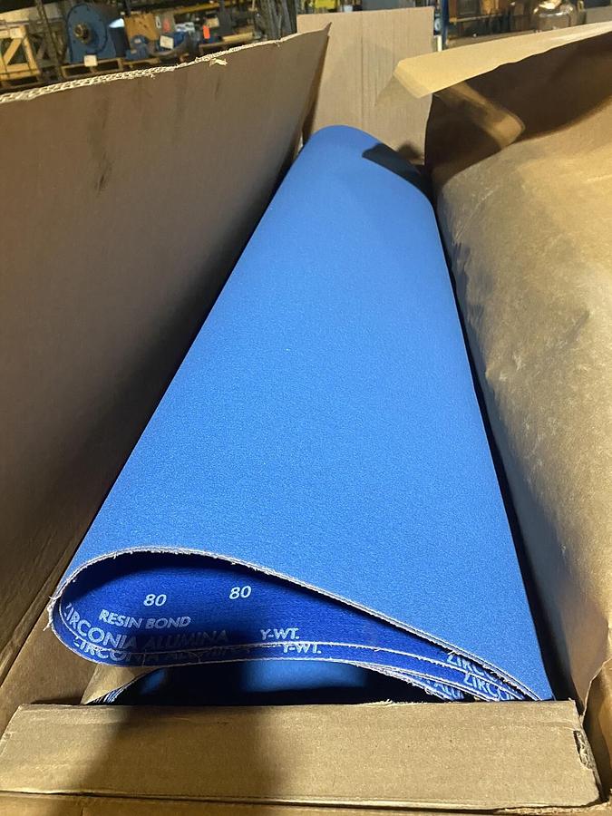 Used CARBORUNDUM,38657,80GRIT ZIRCONIA ALUMINA RESIN CLOTH 51"X126 3 BELTS SKID OF 14