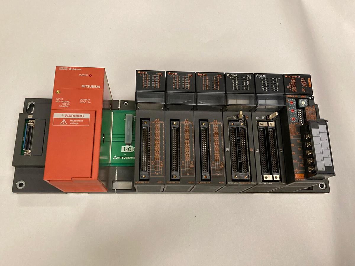 Used Mitsubishi,A1S61PN/A1SY41 (x3) /A1SH42/ A1SX42/A1SJ61BT11,Rack Assembly