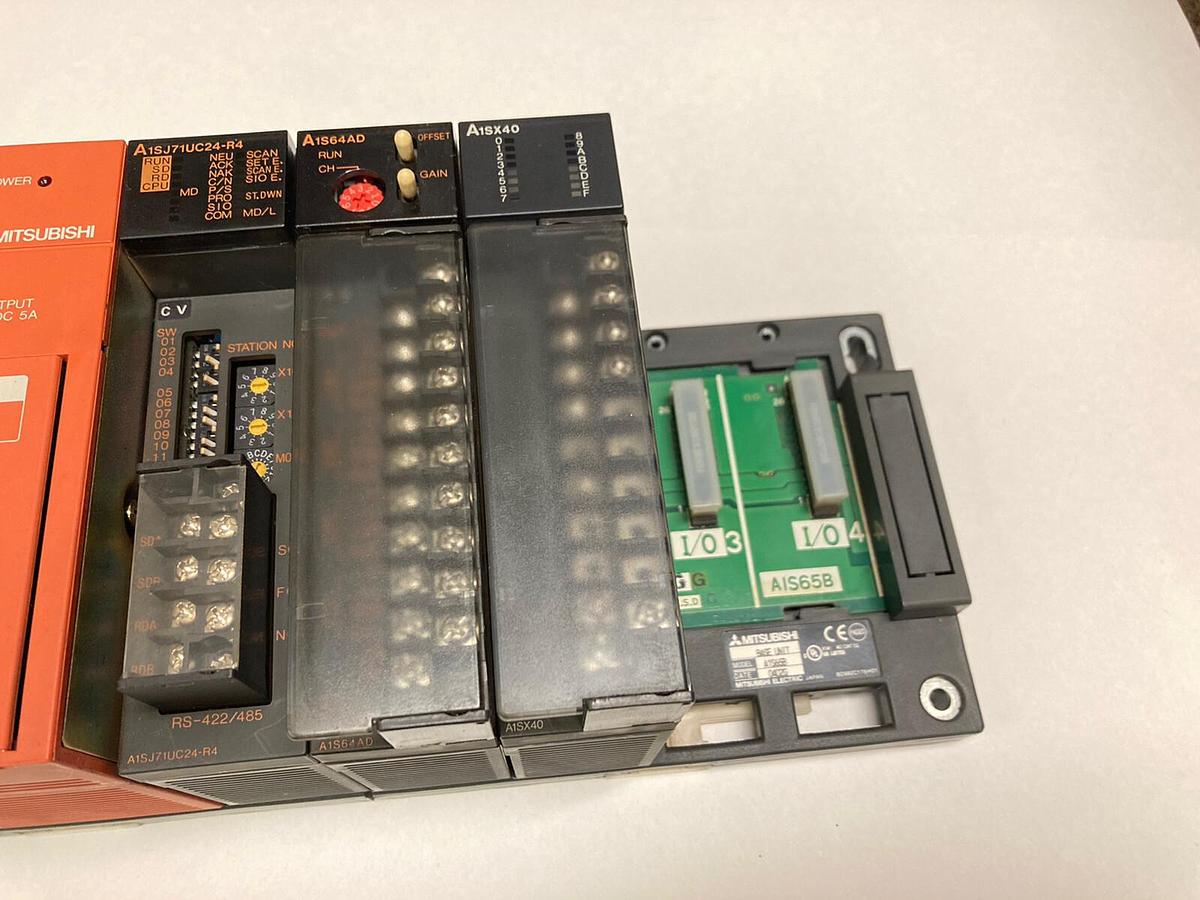 Used Mitsubishi,A1S61PN A1SJ71UC24-R4 A1S64AD A1SX40,PLC Rack Assembly