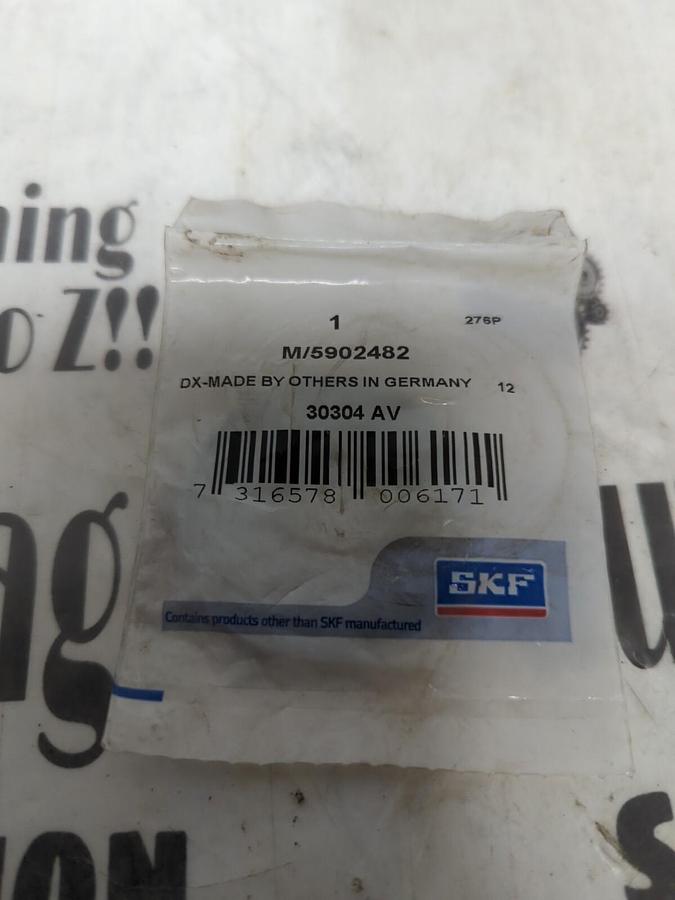 Used SKF,30304 AV  M/5902482,NILOS RING 20MM ID  49MM OD NEW