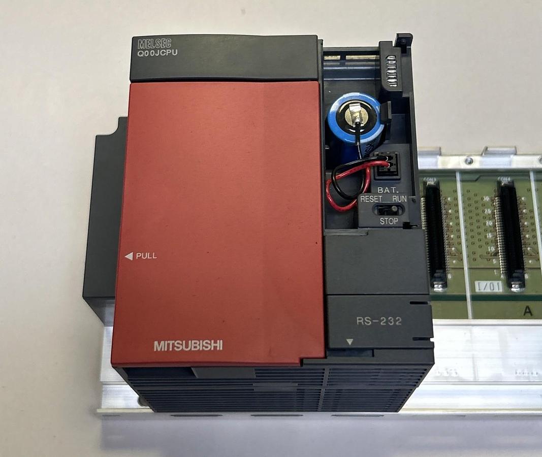 Used MITSUBISHI,Q00JCPU,POWER SUPPLY AND CPU MODULE W/ RACK MISSING COVER