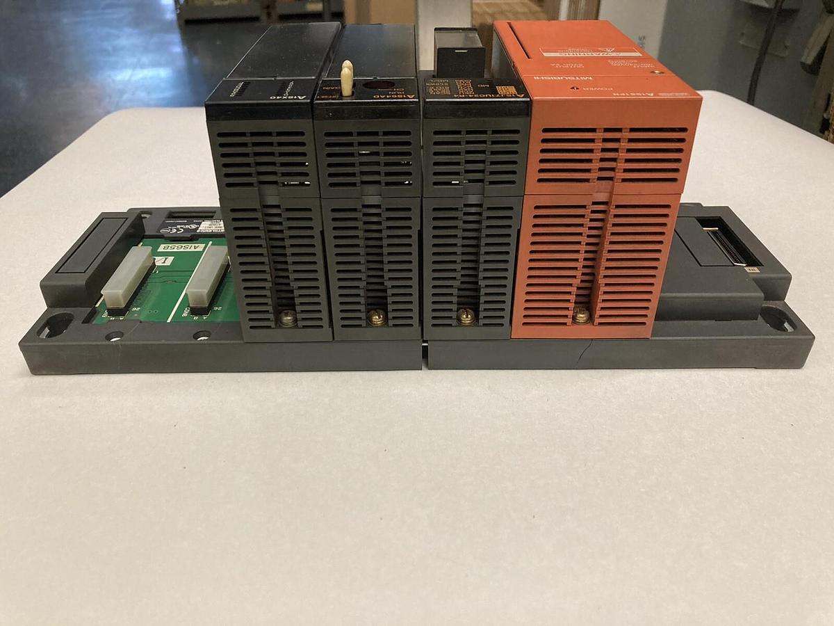 Used Mitsubishi,A1S61PN A1SJ71UC24-R4 A1S64AD A1SX40,PLC Rack Assembly