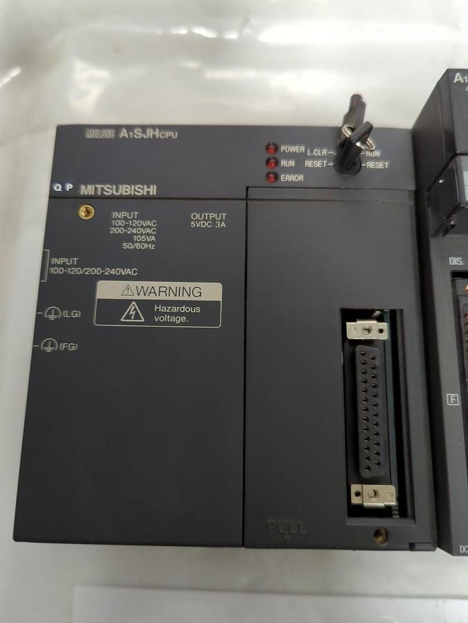 Used MITSUBISHI,A1SJHCPU,CPU UNIT W/ 5-SLOT RACK W/ A1SX42 AND A1SY42 MODULES