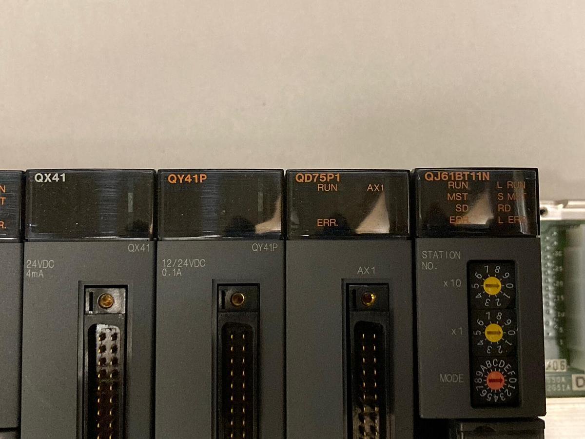 Used Mitsubishi,Q61P Q01UCPU QJ61BT11N x2 QX41 QY41P QD75P1,Rack Assembly