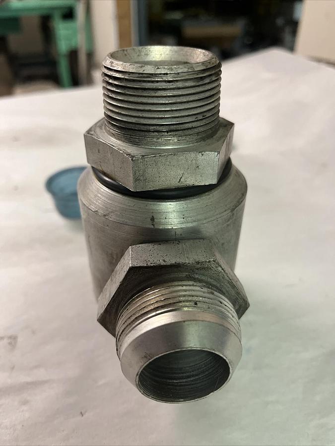 HIGH PRESSURE,90 DEGREE,HYDRAULIC SWIVEL 1-1/4" NPT X JIC 14  1-3/16" 12 THR/In