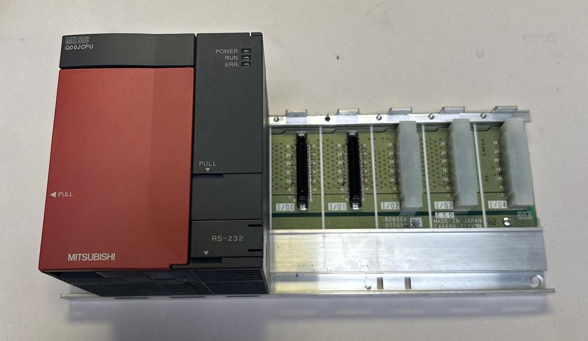 Used MITSUBISHI,Q00JCPU,POWER SUPPLY AND CPU MODULE W/ RACK