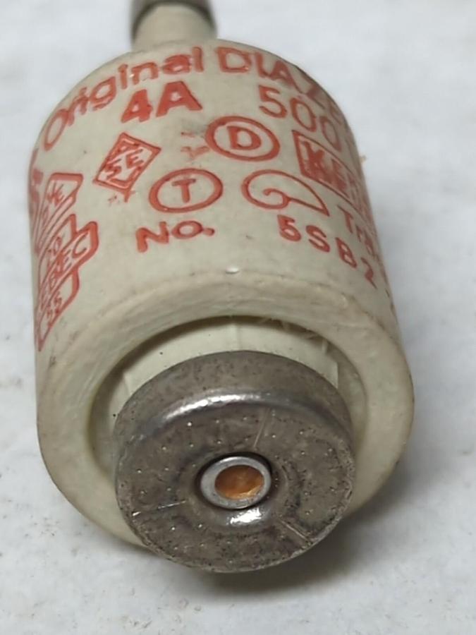 Used TRAGA,5SB2-2,CERAMIC BOTTLE FUSE 4 AMP PRE-OWNED