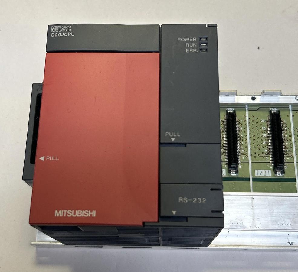 Used MITSUBISHI,Q00JCPU,POWER SUPPLY AND CPU MODULE W/ RACK