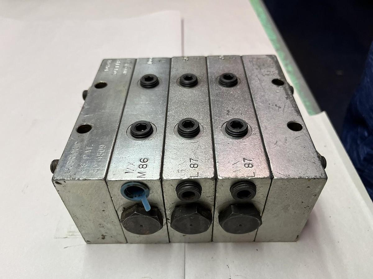 Used LUBRIQUIP,MXM-86-100T,W TWO MXL-87-50S VALVE BANK