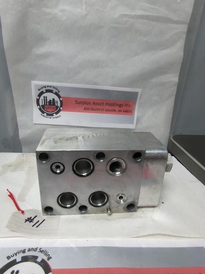 Used SUN HYDRAULICS,HBM,MANIFOLD IGTO-A2 WITH CKGB-XCN VALVE/BOLT USED