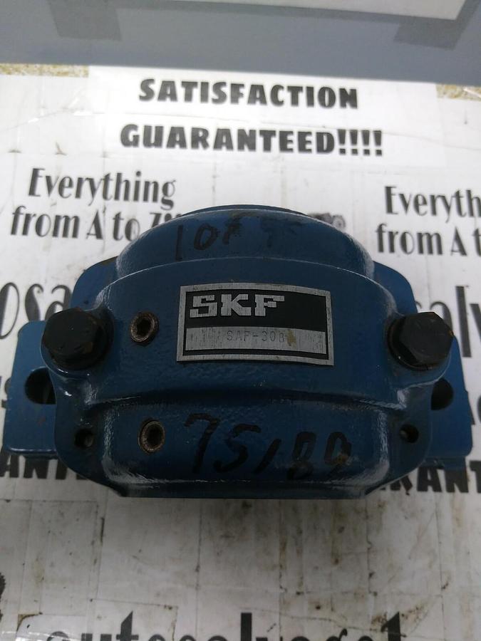 Used SKF,308,PILLOW BLOCK HOUSING  2 BOLT BASE SPLIT PILLOW BLOCK 1.4375 IN BASE NOS