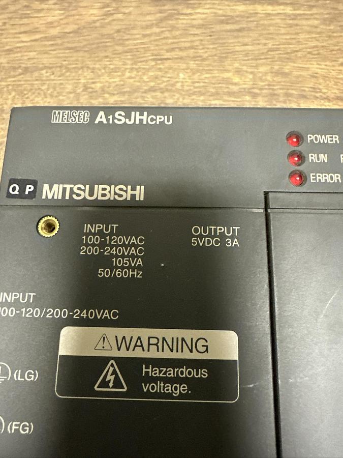 Used Mitsubishi,A1SJHCPU,W/3 A1SY42 Output Modules
