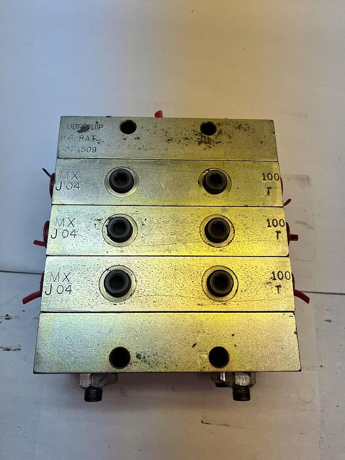 Used LUBRIQUIP,MXJ-04-100T,THREE VALVE BANK