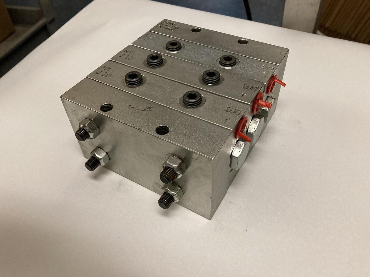 Used Graco,MXL07-100T, MXJ10100T MXJ10-100T, Divider Valve 3074509