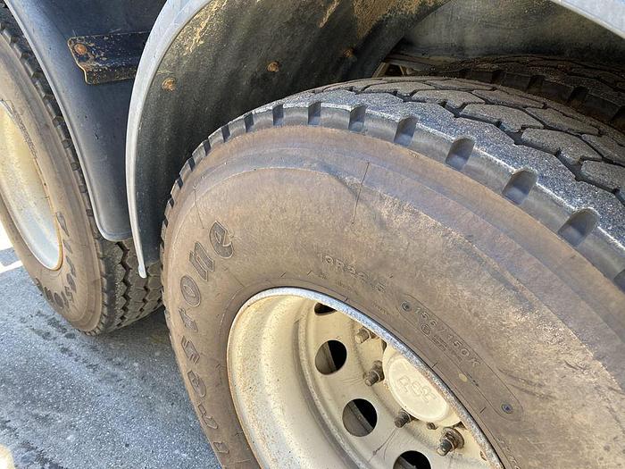 Usato 2010 IVECO TRAKKER 500 CON SEMIRIMORCHIO VASCA