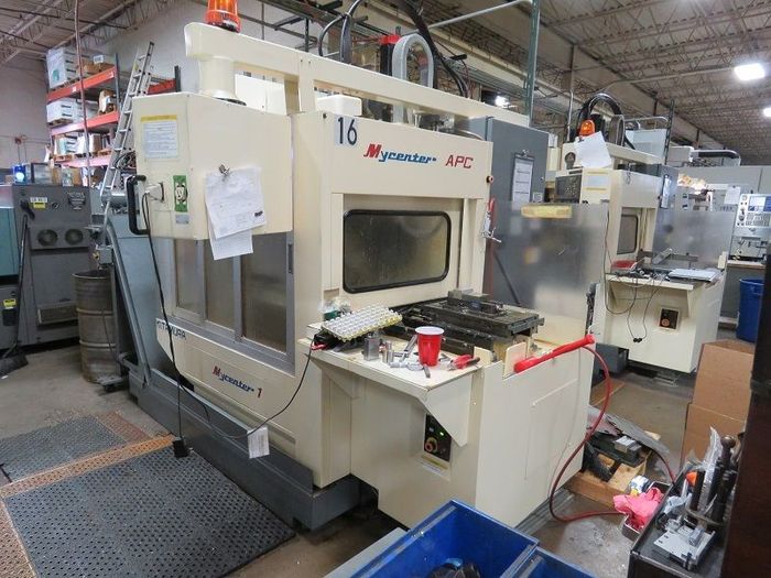 Used KITAMURA MYCENTER 1 APC - CNC VMCwith Pallet changer 1995