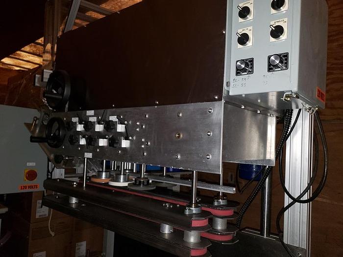 Used EQUIPMENT EXPRESS BOTTLING LINE (FILLER AND CAPPER)