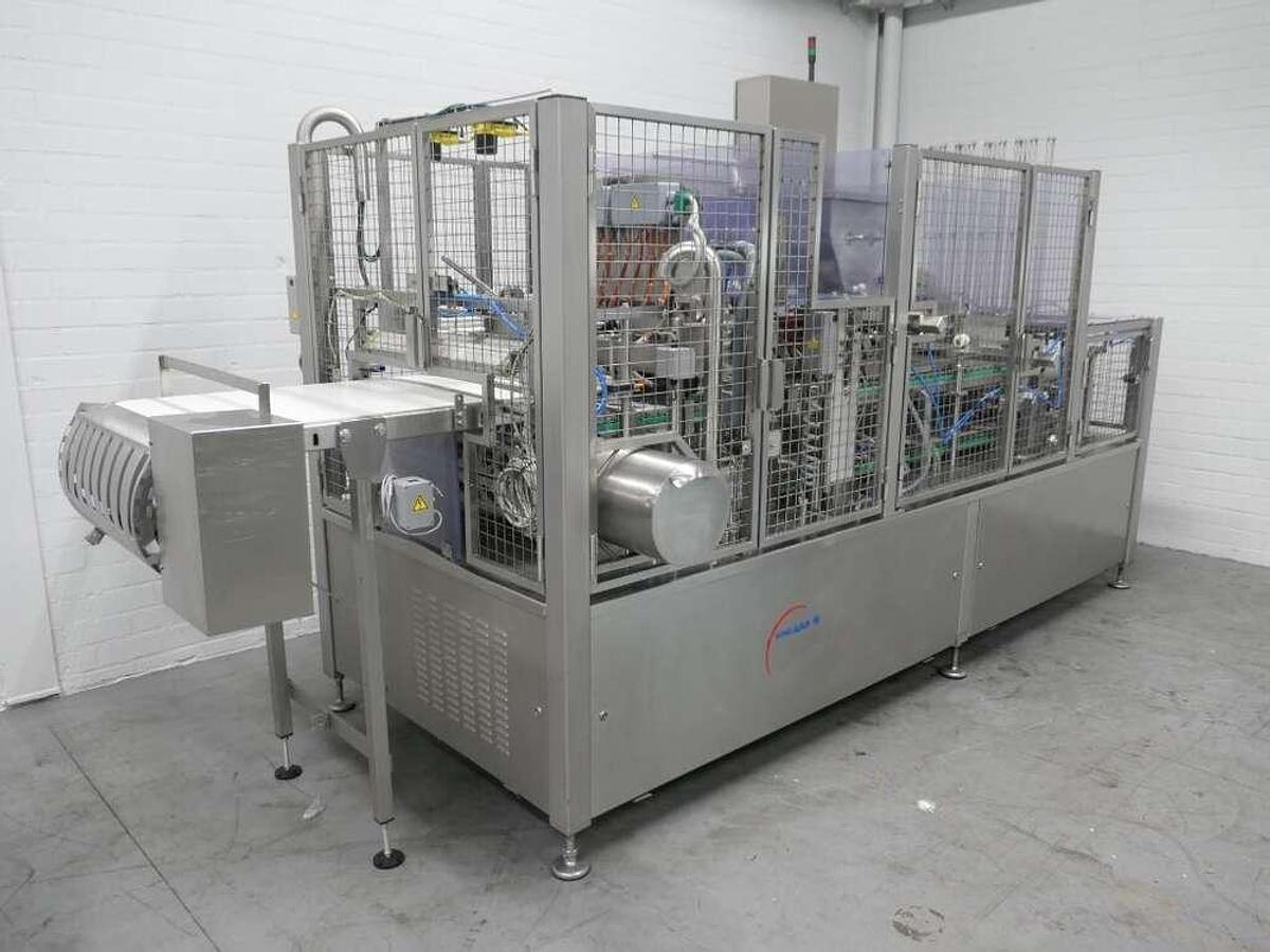 Used Grunwald filling- & closing machine