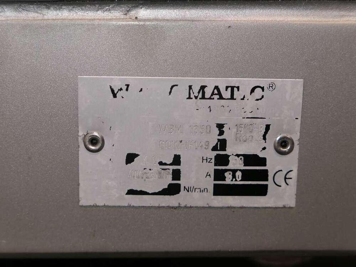 Used Webomatic belt vacuum machine