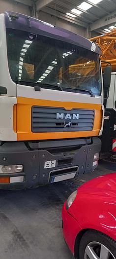 Usado HIAB 400 E-8 SOBRE CAMIÓN MAN