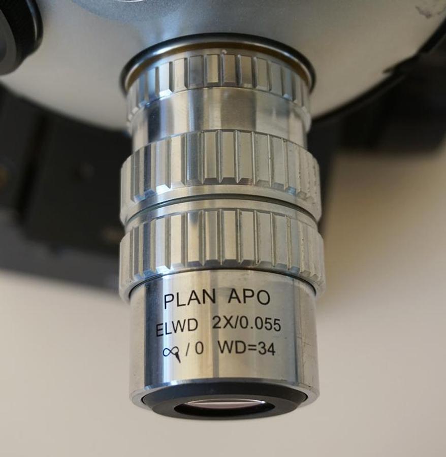 Used Motic PSM1000 probe station microscope with focus block, fiber optic illuminator,  and 2x/5x ELWD objectives