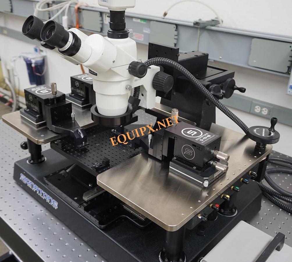 Used Signatone 1160A-6N manual prober with (3) S-M40 Rf positioners and Olympus microscope with camera